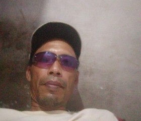 Aris, 41, Tebingtinggi