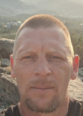 Николай