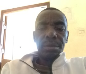 Oliver Munene, 50, Lusaka