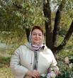 Мила