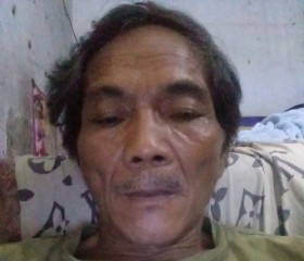 Endang darma, 60, Jakarta