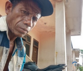 Yohanes mamulak, 42, Banjarmasin