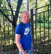 николай