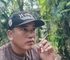 Fahmi, 38, Jambi City