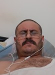 Hasan, 41, Doha